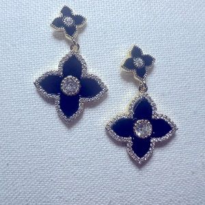 Black designer clover earrings